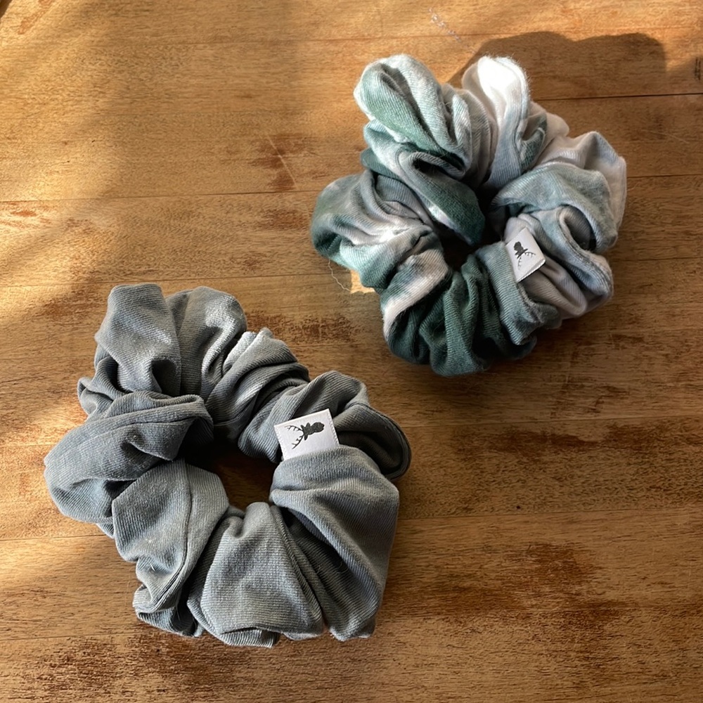 American Eagle scrunchies, one tie-dye and one grey.